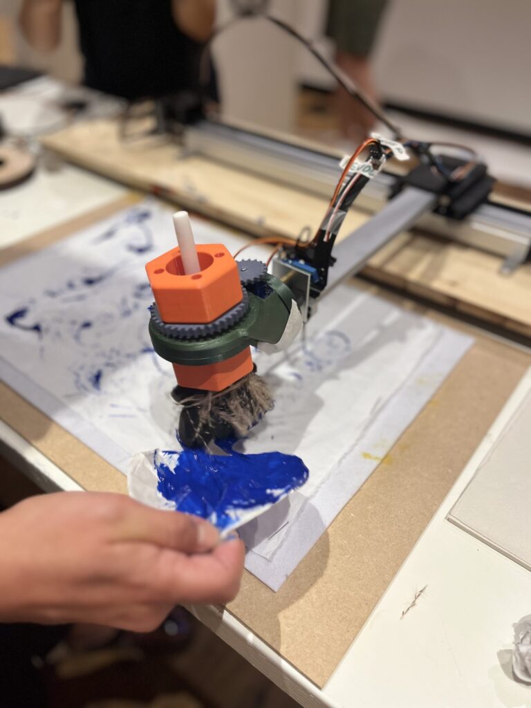 Feeding paint on in between machine movement