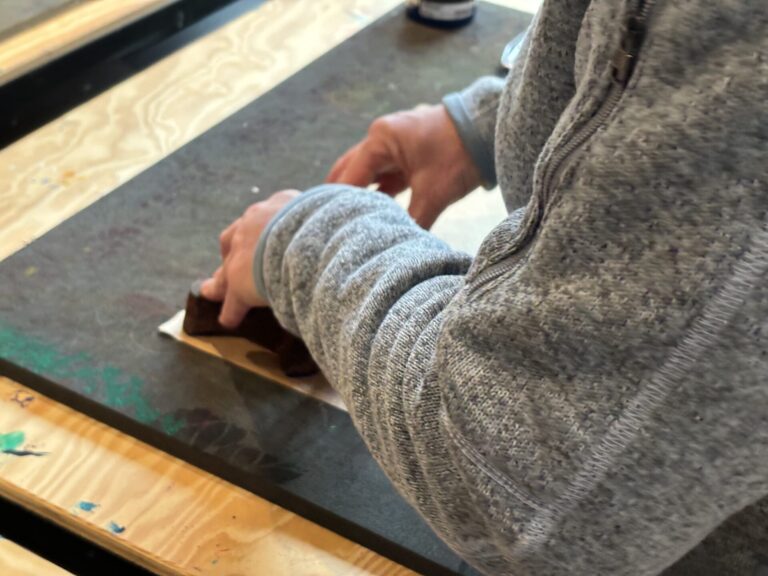 Pressure applied to a block in blockprinting by Nathalie Cassee