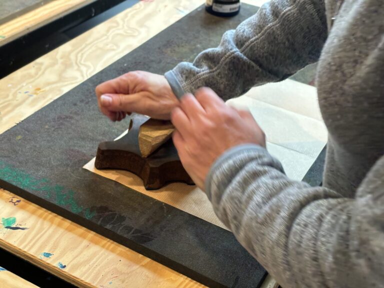 Pressure applied to a block in blockprinting by Nathalie Cassee